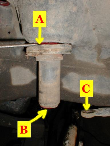 Remove this coil isolator, bumpstop & swaybar link.