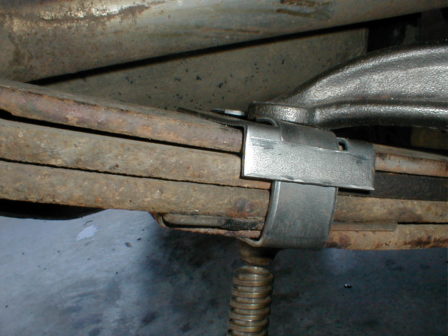 Claming down leaf spring clips.